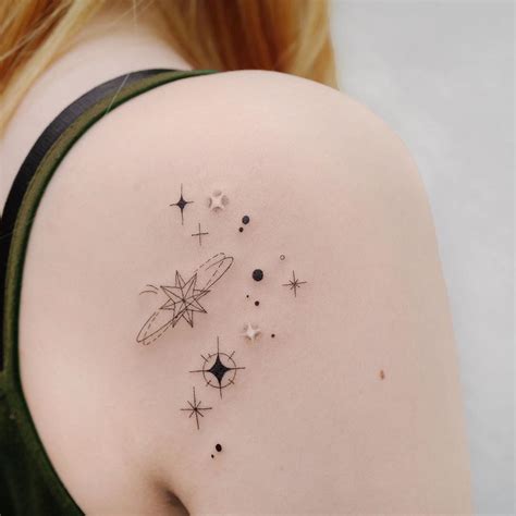 Ethereal tattoos of celestial bodies