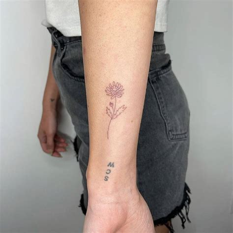 Chrysanthemum flower tattoo placement