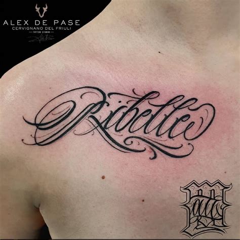 Cursive tattoo lettering