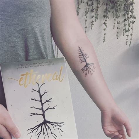 Ethereal tree tattoos symbolizing growth