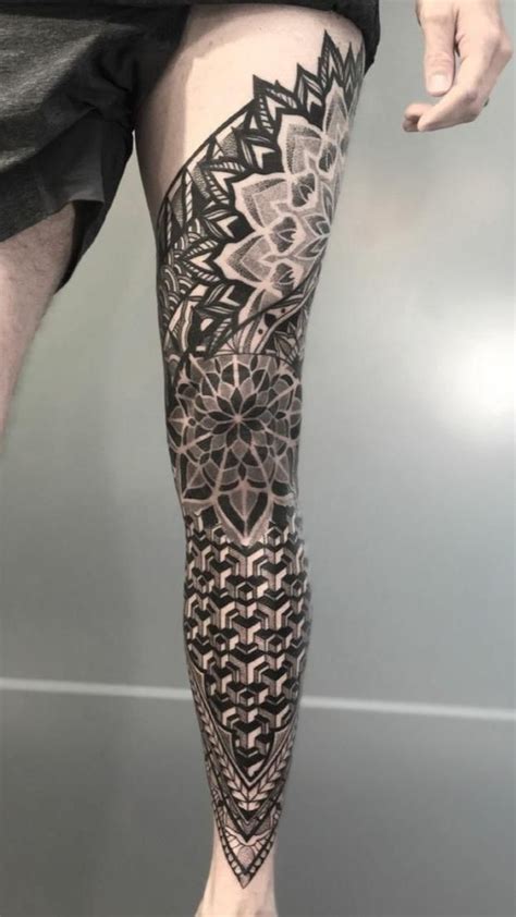 Geometric pattern leg sleeve tattoo