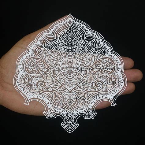 Intricate Cut-outs on Transparent Paper