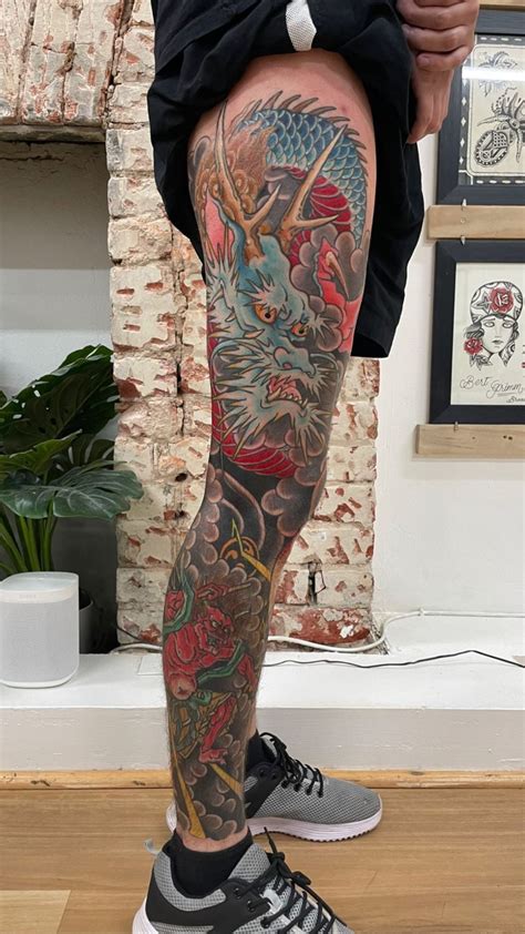 Japanese themed leg sleeve tattoo