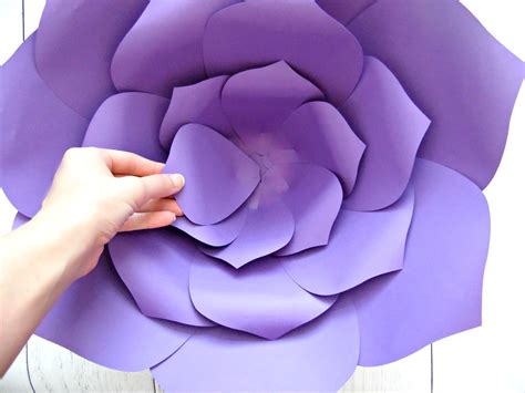 Large paper flowers in various colors and designs