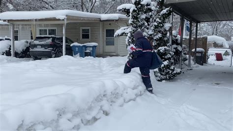 Mail Carrier in Snow