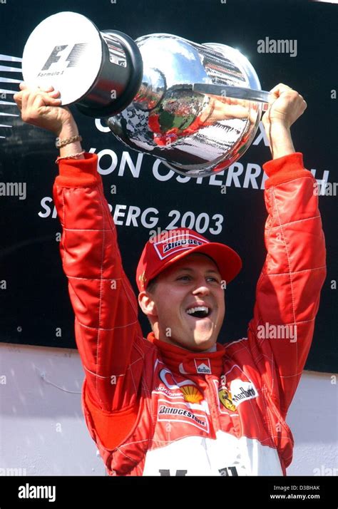 Michael Schumacher celebrating a championship win