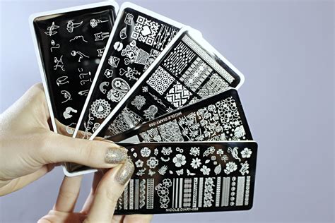 Nail stamping plates