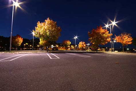 Description of a parking lot diorama at night