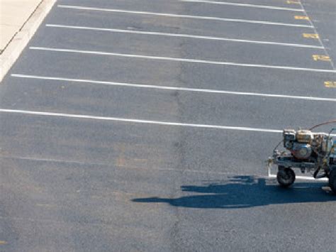 Parking lot striping materials and equipment