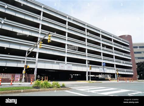 Description of a parking lot diorama with surrounding buildings