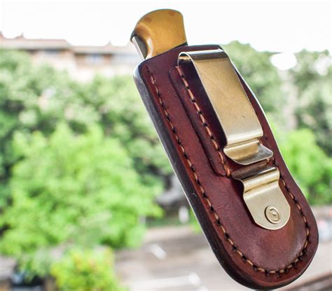 Pocket knife sheath with belt clip