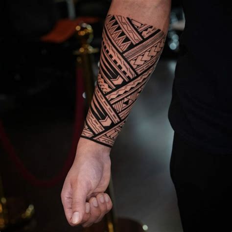 Tribal full sleeve tattoo